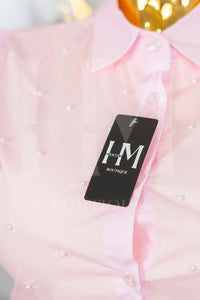 Camisa de manga corta con detalles en perlas