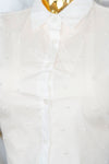 Camisa de manga corta con detalles en perlas