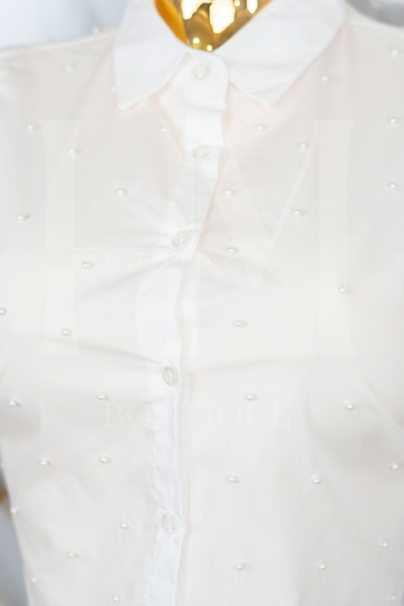 Camisa de manga corta con detalles en perlas
