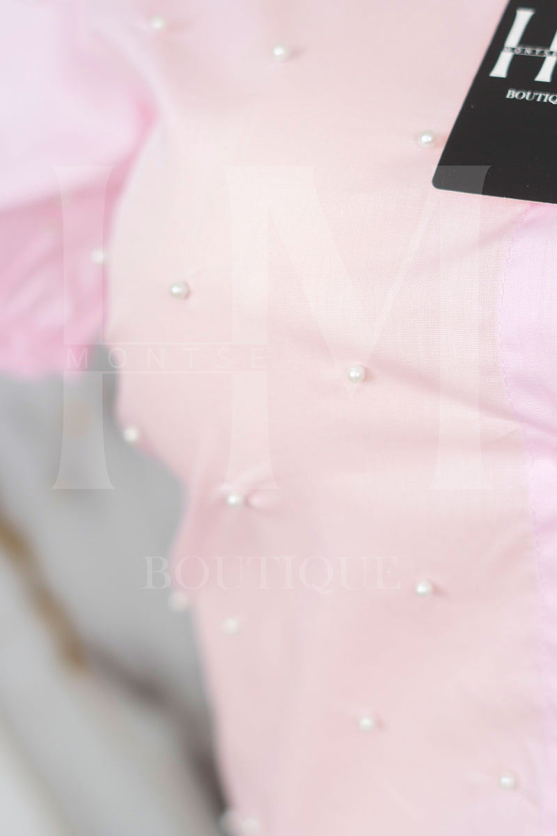 Camisa de manga corta con detalles en perlas