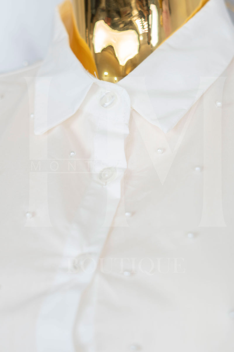 Camisa de manga corta con detalles en perlas