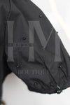 Camisa de manga corta con detalles en perlas