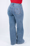 Pantalon de mezclilla hide leg con bastilla ancha