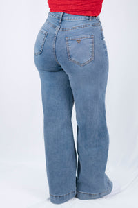 Pantalon de mezclilla hide leg con bastilla ancha