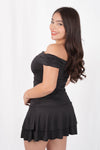 Vestido strapless corto con olanes