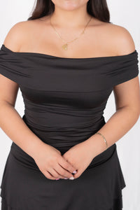 Vestido strapless corto con olanes