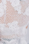 Blusa tejida con detalles en lentejuelas
