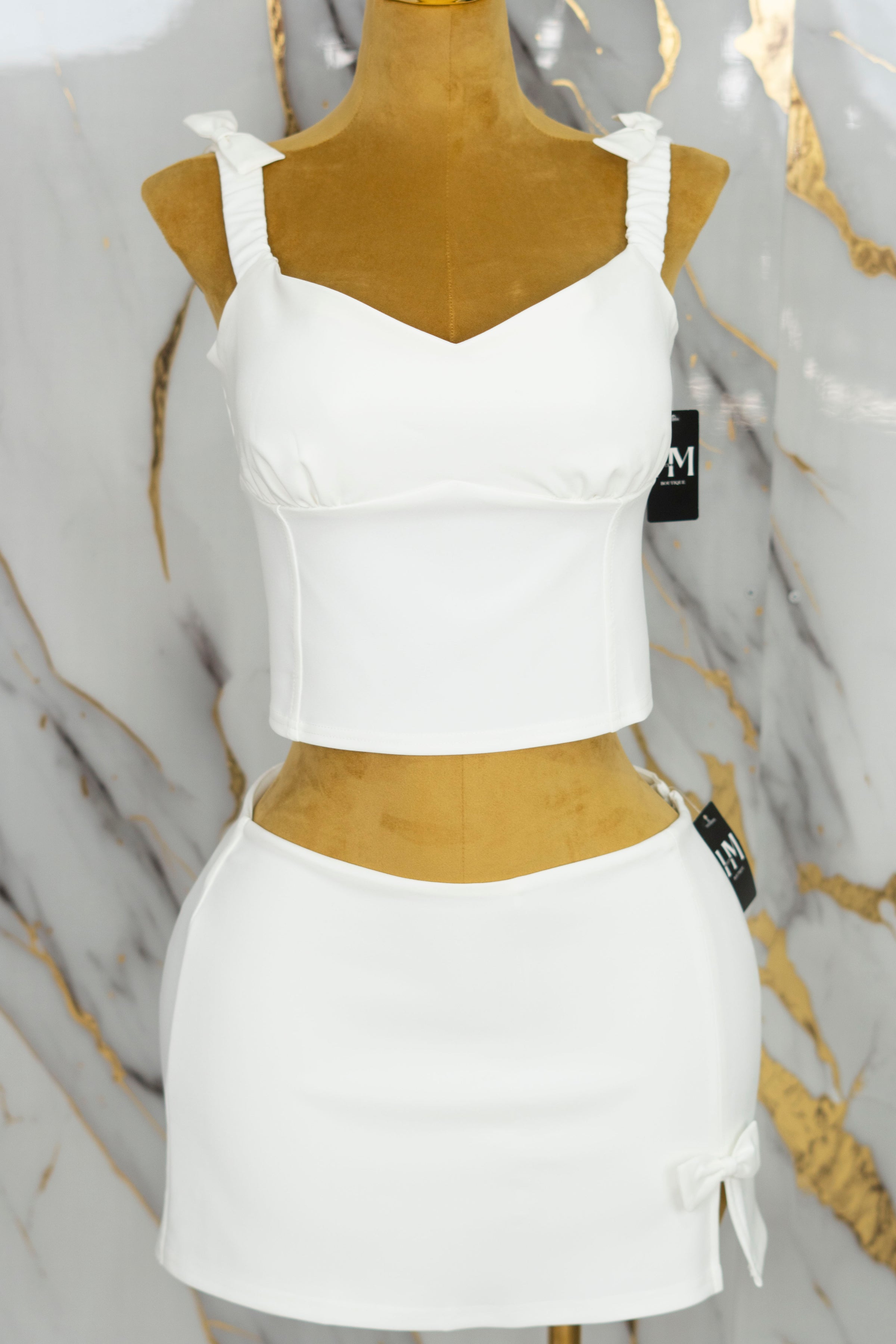 Conjunto con detalle de moños