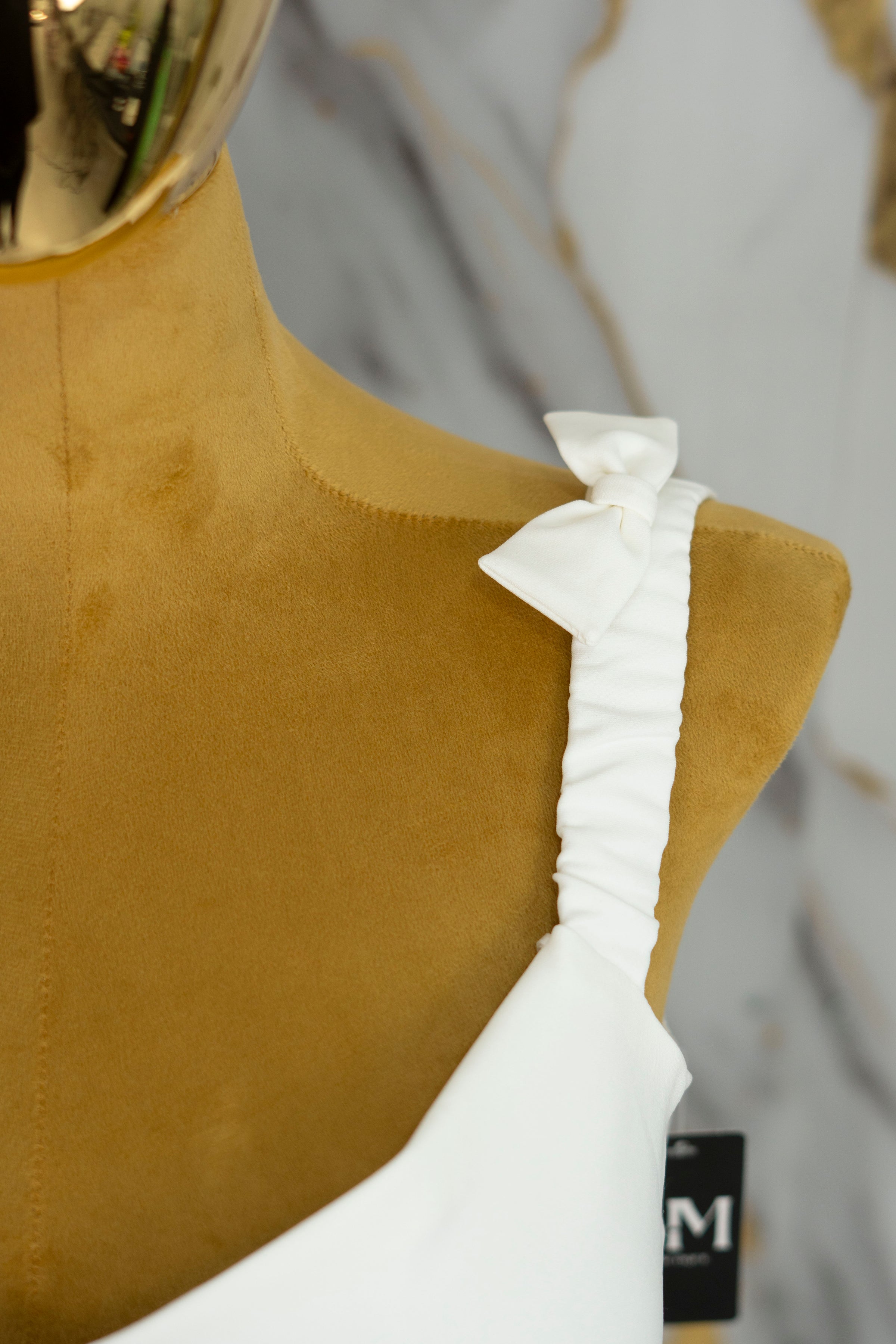 Conjunto con detalle de moños