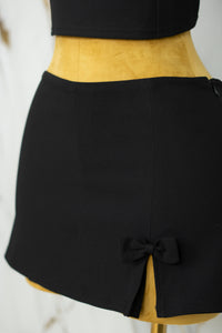 Conjunto con detalle de moños