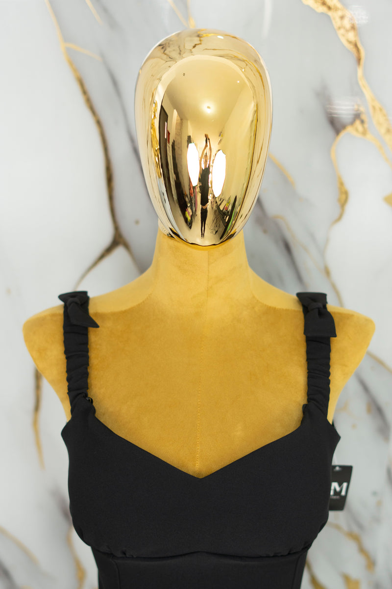 Conjunto con detalle de moños