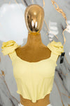 Corset con flor en hombro