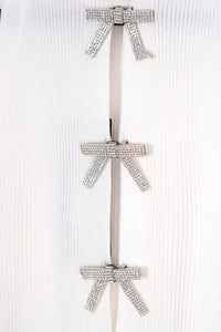 Vestido corto con moños de piedras
