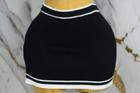 Conjunto casual de falda y blusa con cuello