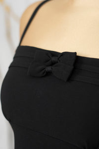 Vestido corto con detalle en moños