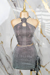 Conjunto de brillo con detalles de flor