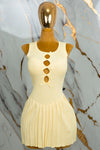Vestido corto tableado con moños
