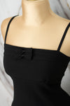 Vestido corto con detalle en moños