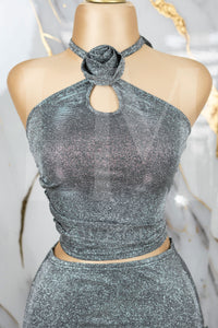 Conjunto de brillo con detalles de flor