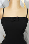 Vestido corto con detalle en moños