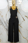 Conjunto con detalles en broches dorados