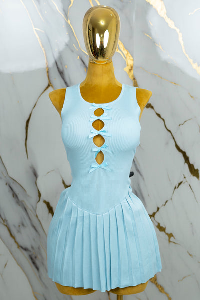 Vestido corto tableado con moños