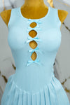 Vestido corto tableado con moños