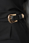 Conjunto con detalles en broches dorados