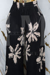 Conjunto floreado de pantalón holgado