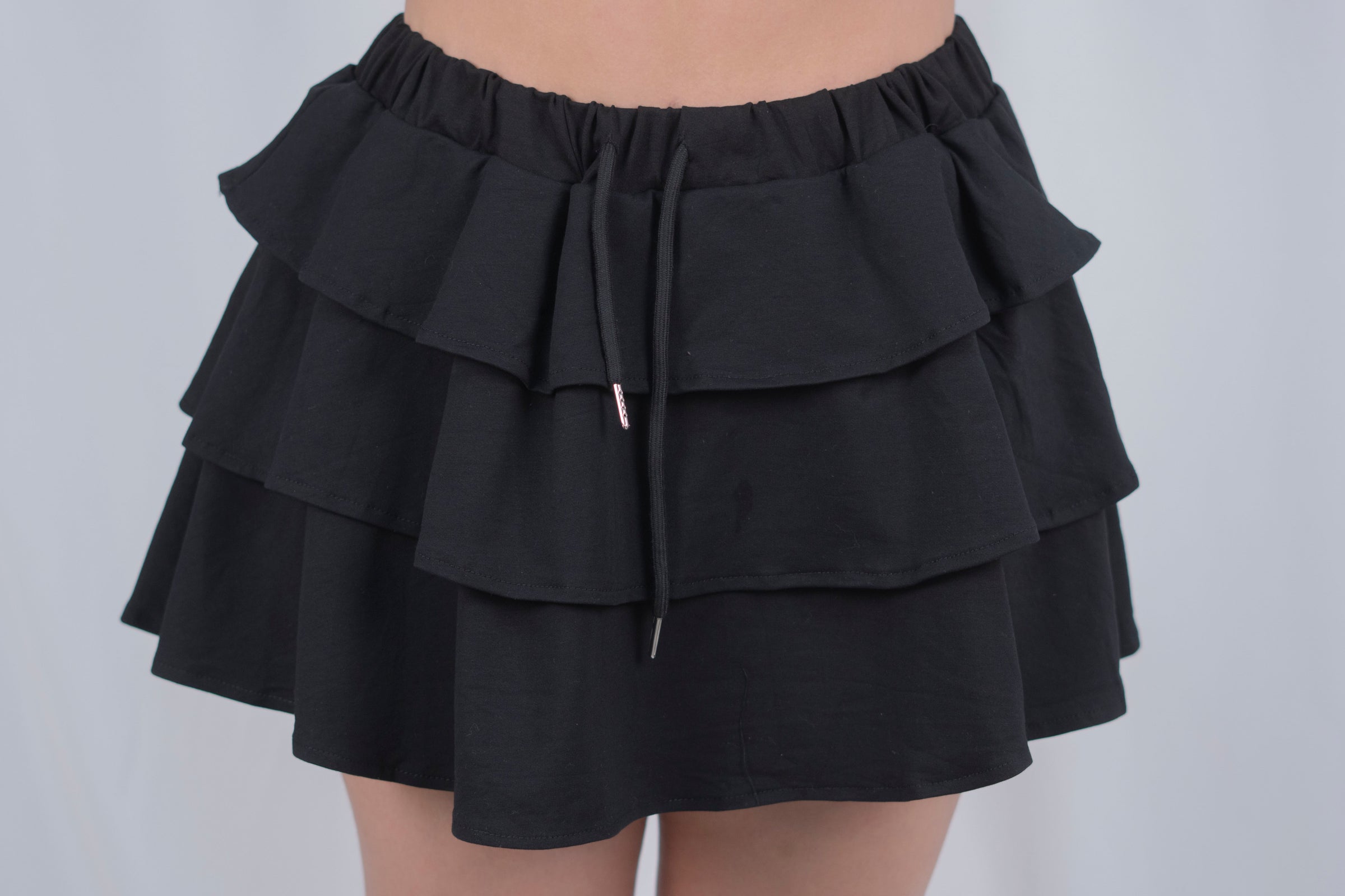 Conjunto casual con falda de olanes
