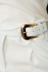 Conjunto con detalles en broches dorados