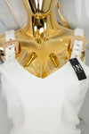 Conjunto con detalles en broches dorados