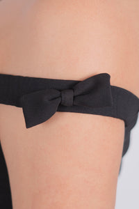 Conjunto con detalle de moños