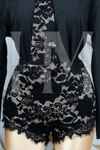 Jumpsuit tipo camisa con encaje