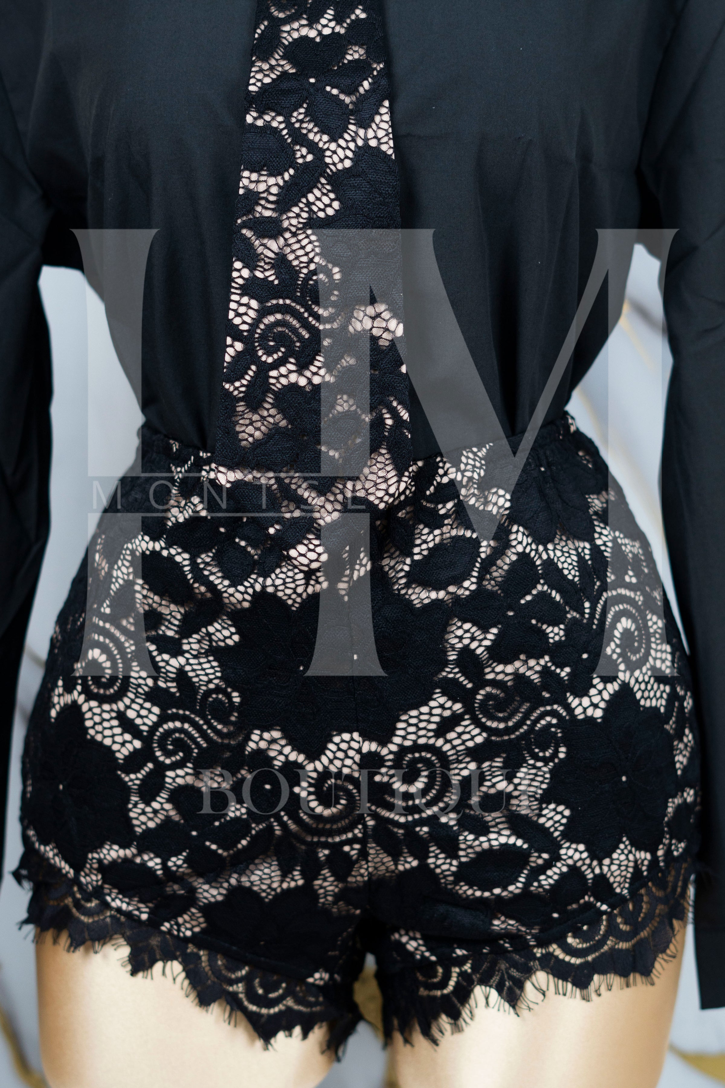 Jumpsuit tipo camisa con encaje