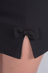 Conjunto con detalle de moños