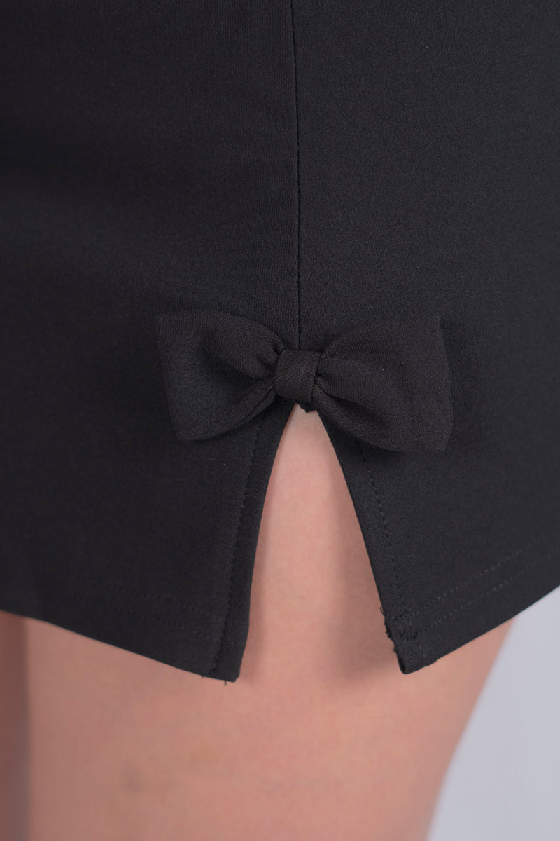 Conjunto con detalle de moños
