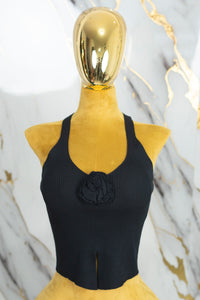 Blusa con detalle en flor