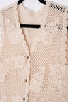 Blusa tejida con detalles en lentejuelas