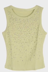Blusa con detalle de piedras y perlas