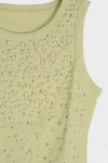 Blusa con detalle de piedras y perlas