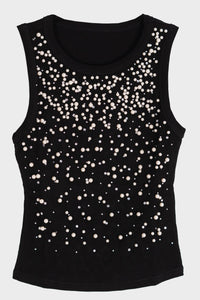 Blusa con detalle de piedras y perlas
