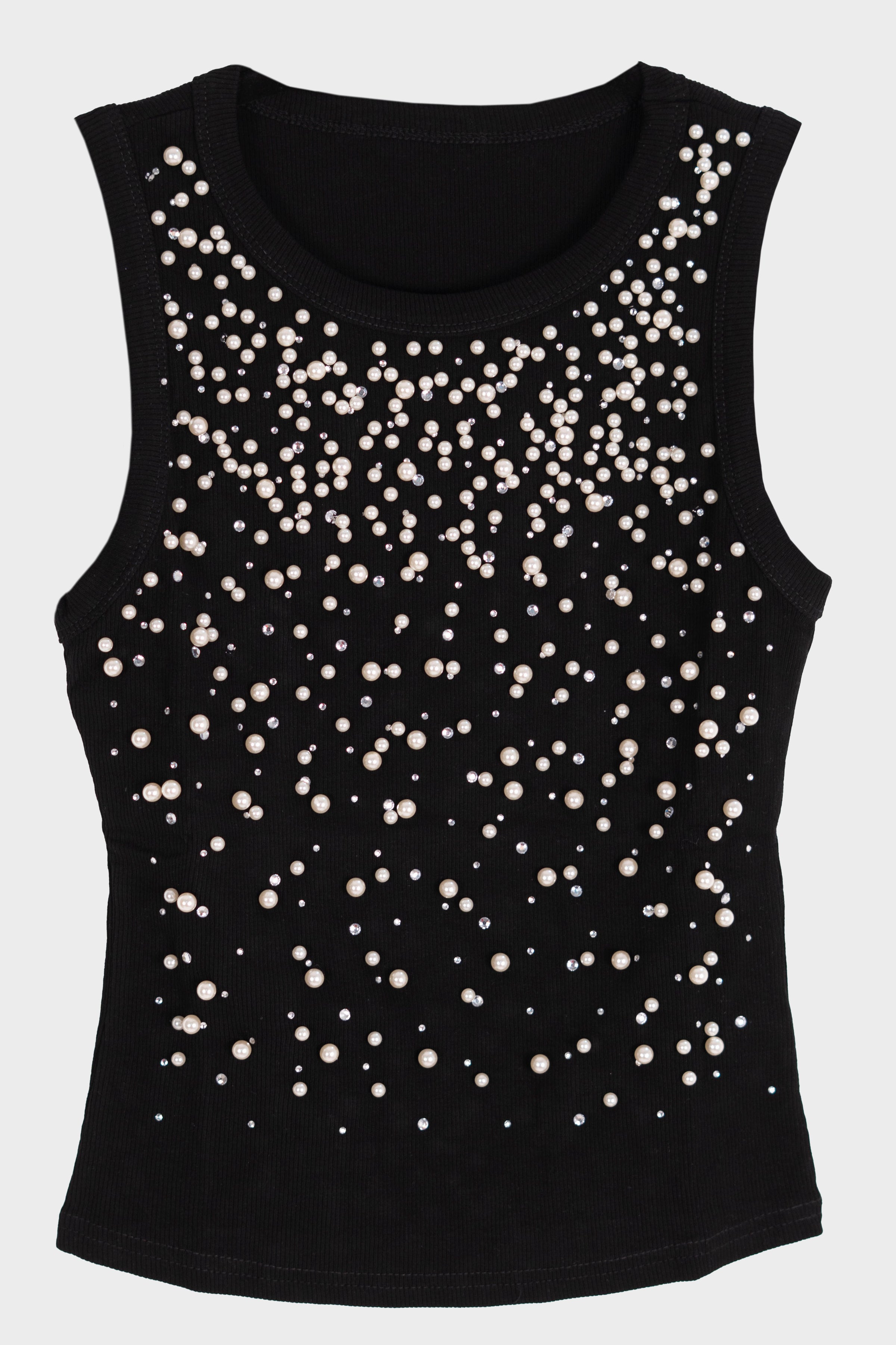 Blusa con detalle de piedras y perlas