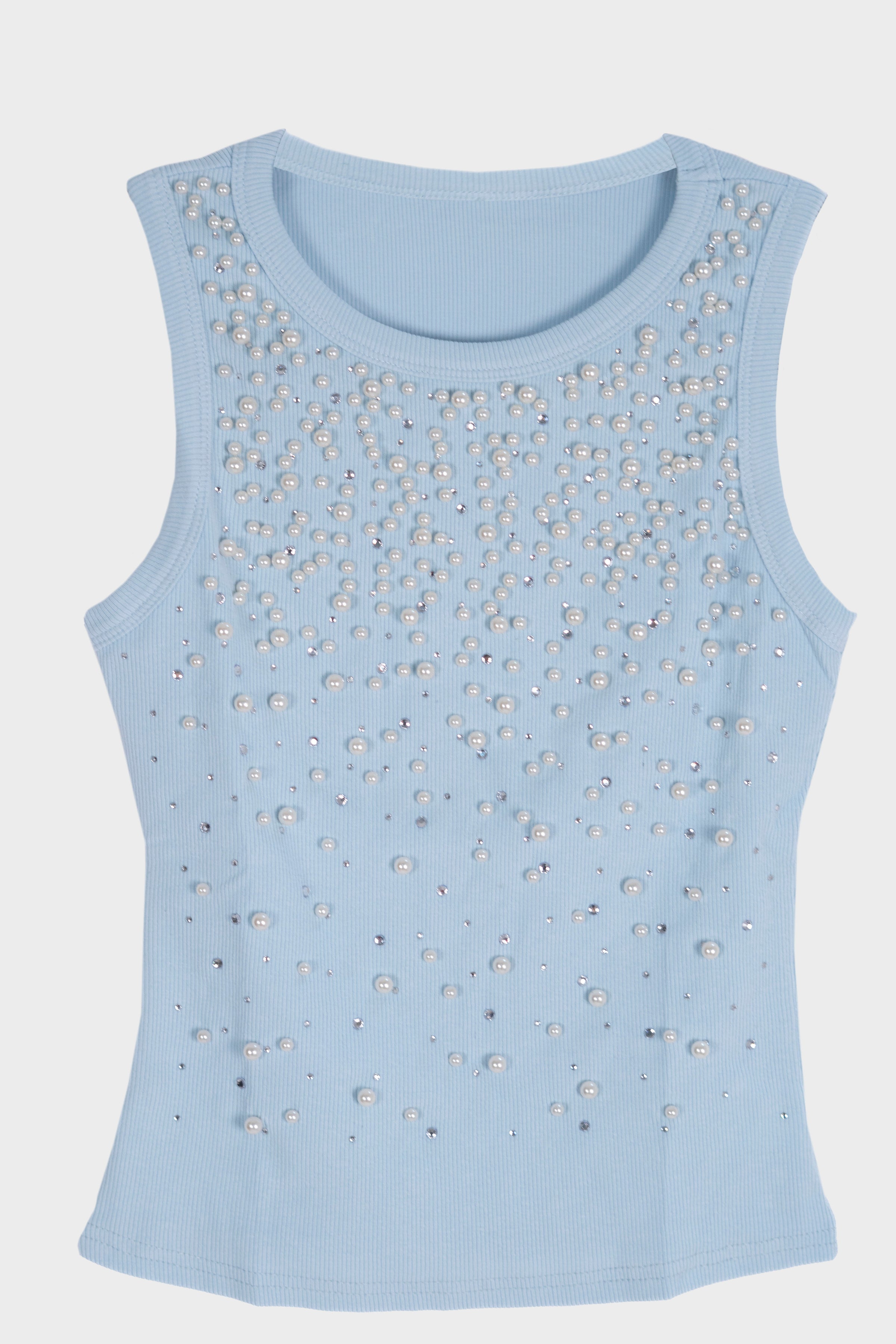 Blusa con detalle de piedras y perlas