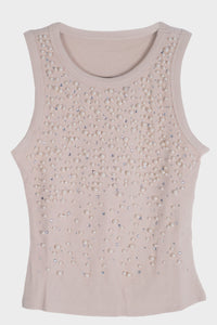 Blusa con detalle de piedras y perlas