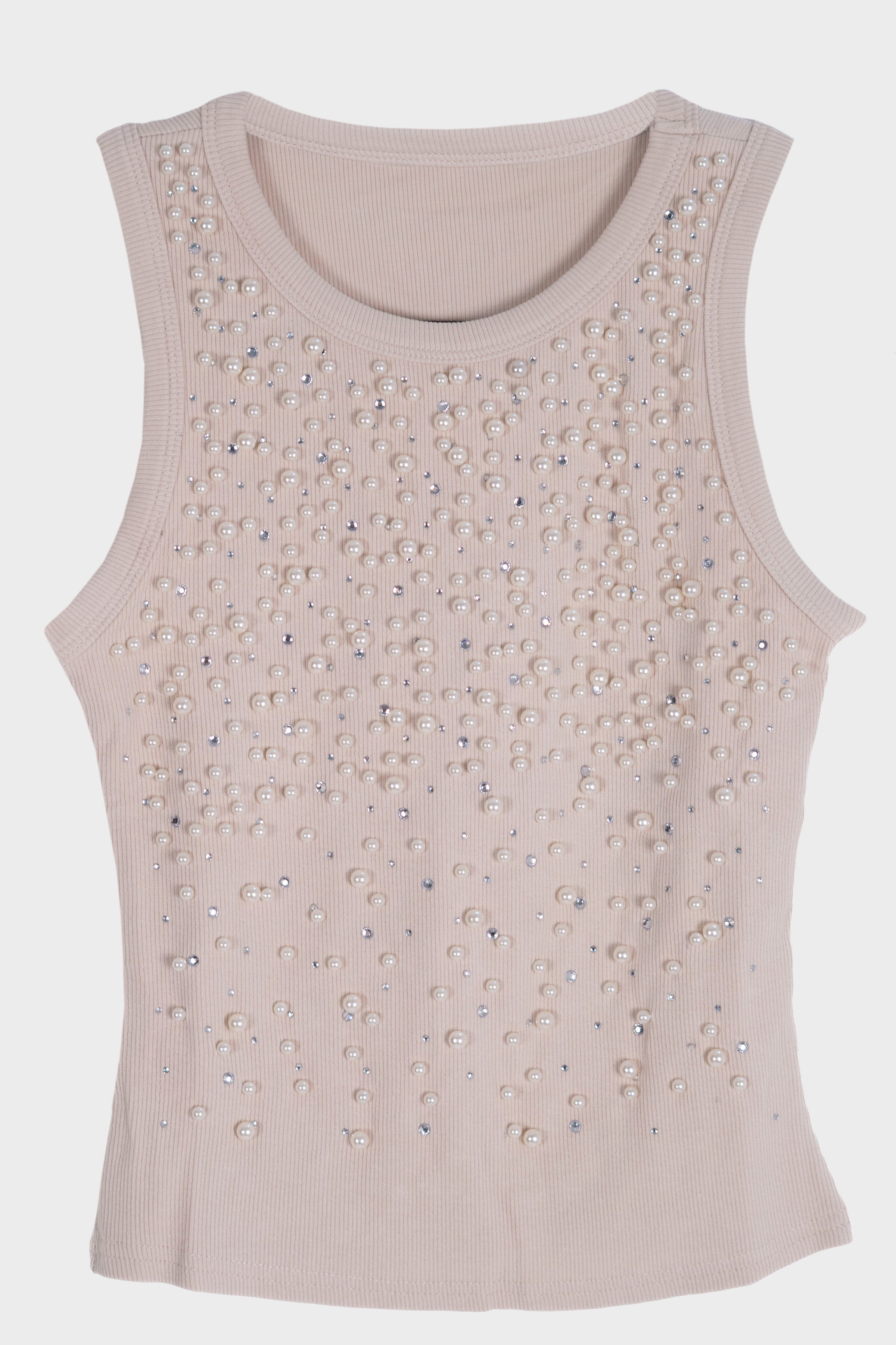 Blusa con detalle de piedras y perlas