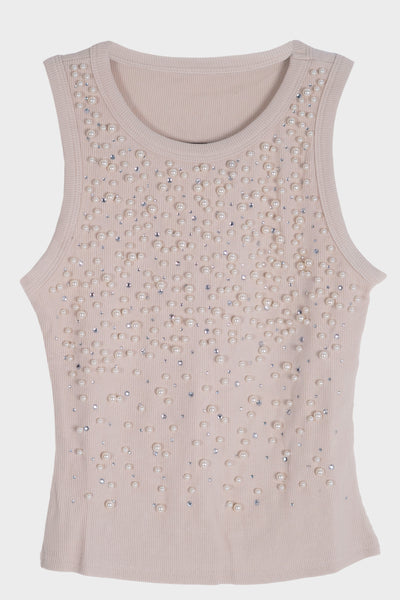 Blusa con detalle de piedras y perlas