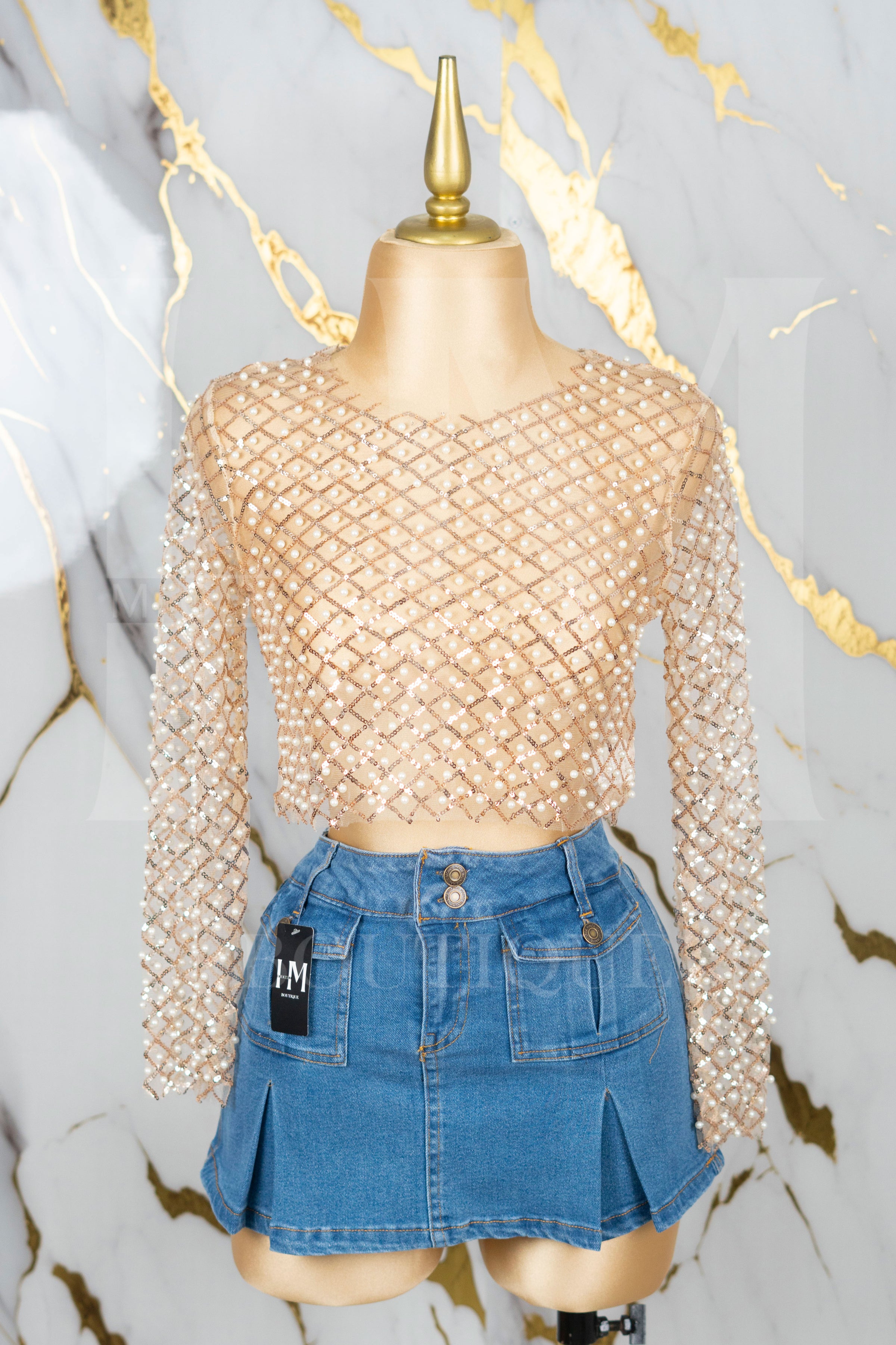 Blusa de piedras manga larga