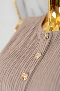 Conjunto de pantalón holgado y botones